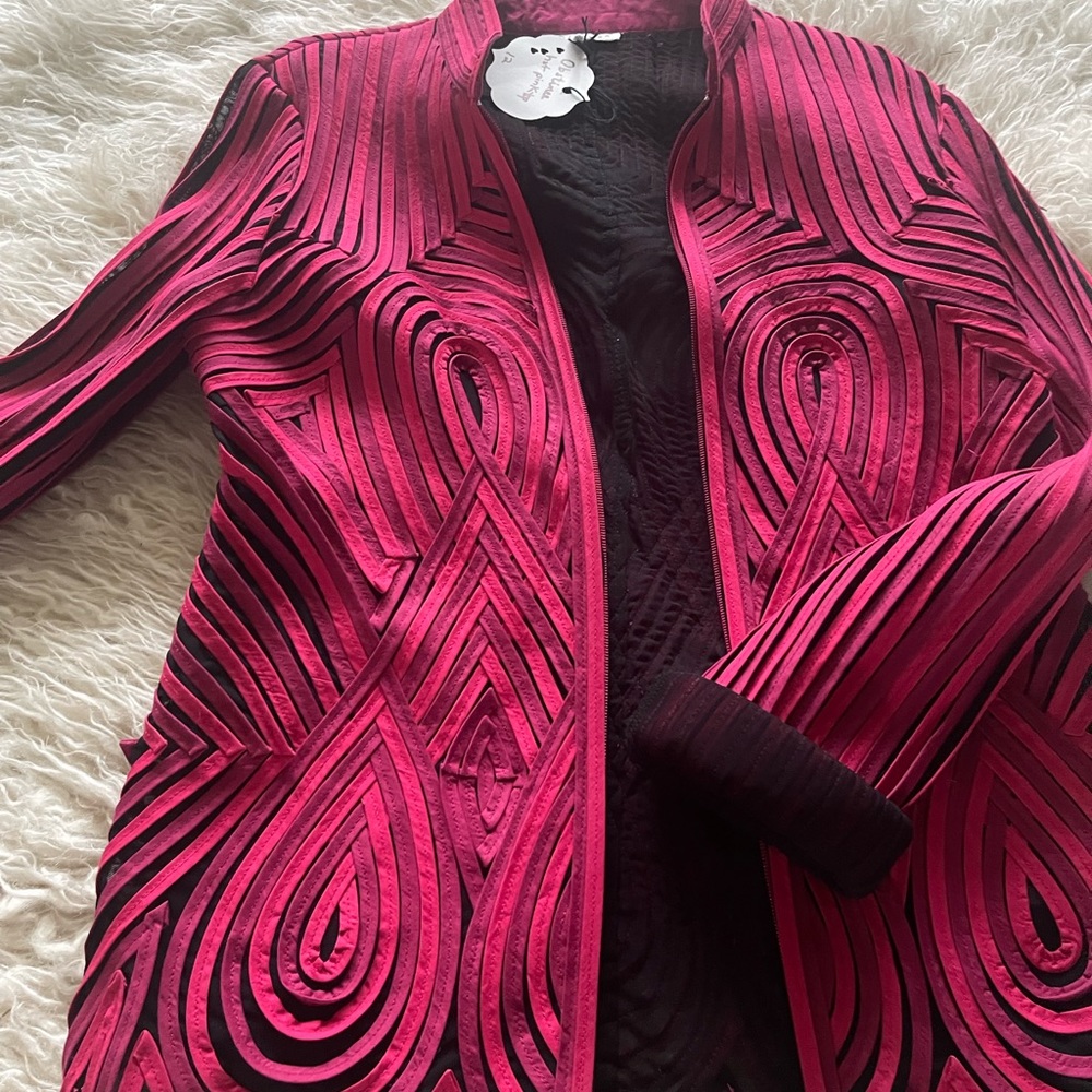 Stunning formal jacket. Construction allows for stretch.